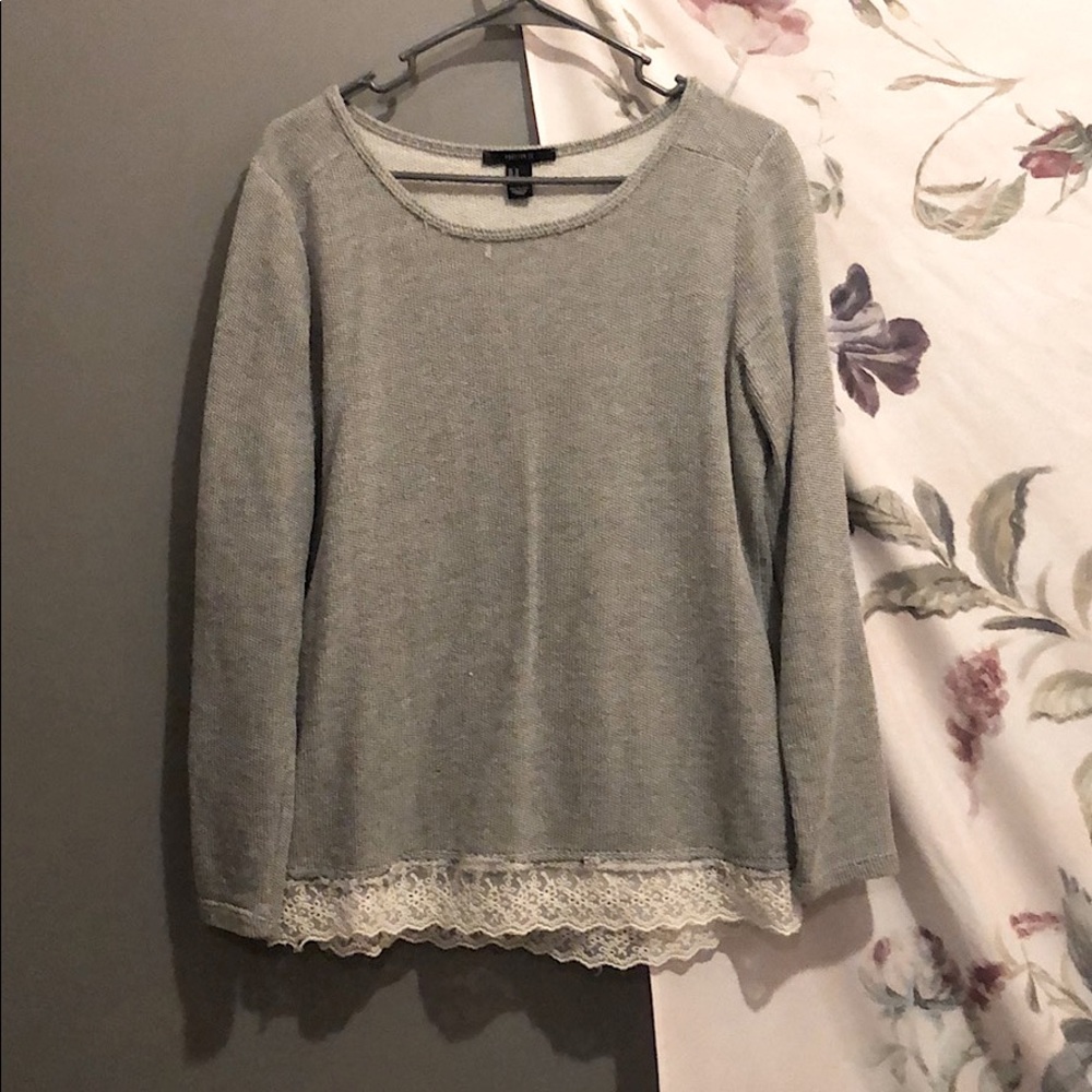 Laced bottom sweatshirt.
